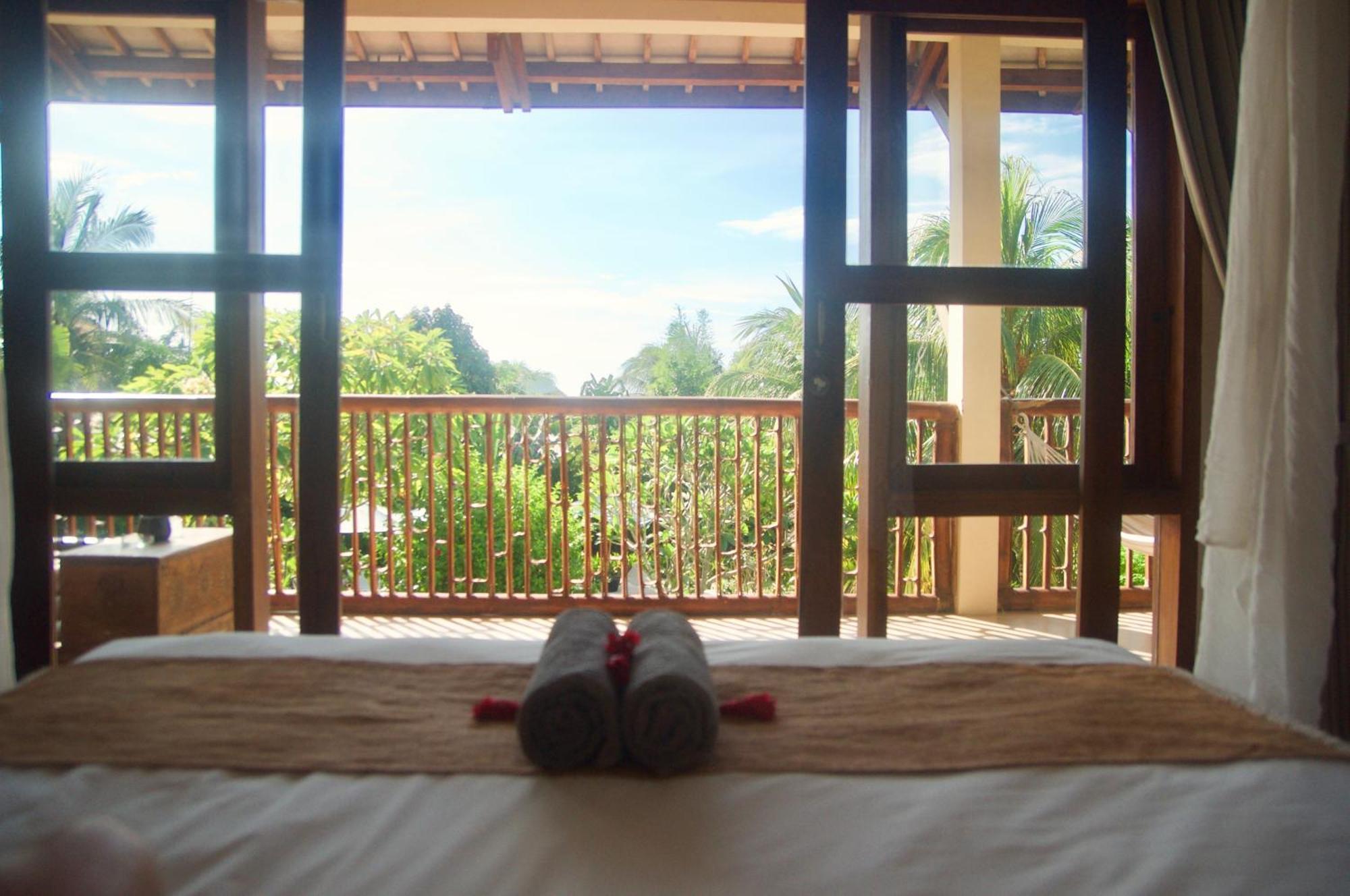 Owa Lodge Areguling Kuta  Phòng bức ảnh