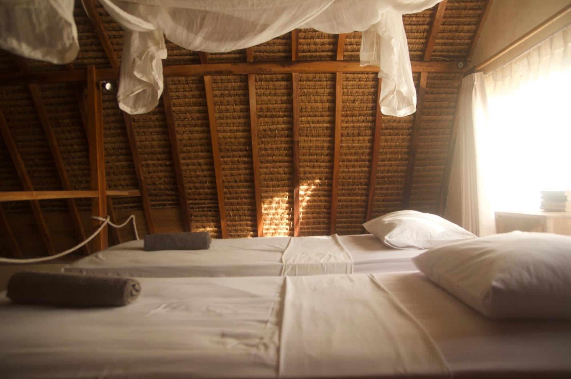 Owa Lodge Areguling Kuta  Phòng bức ảnh