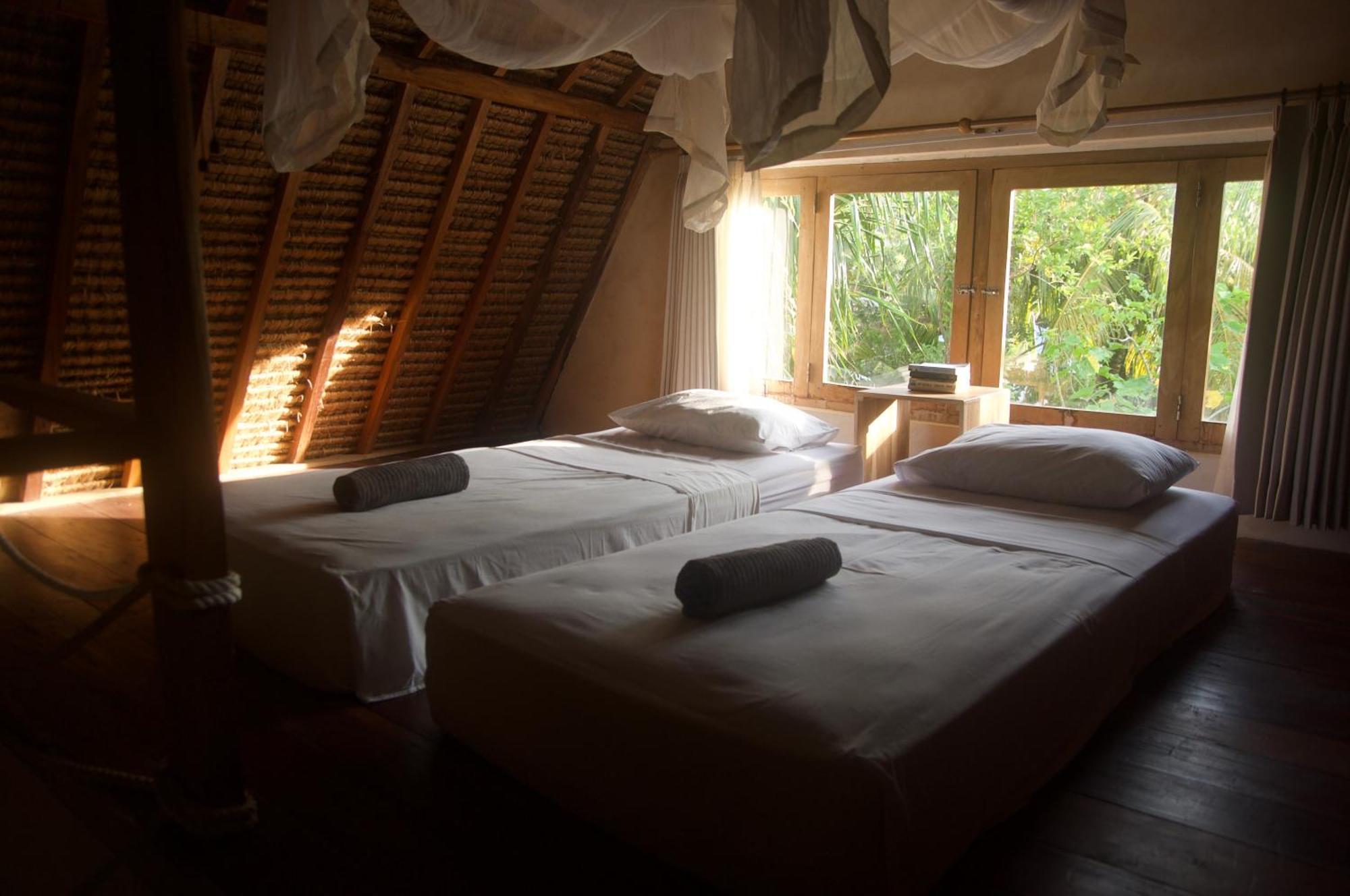 Owa Lodge Areguling Kuta  Phòng bức ảnh
