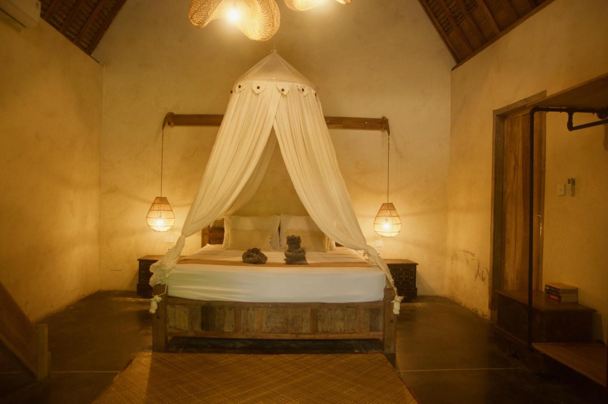 Owa Lodge Areguling Kuta  Phòng bức ảnh